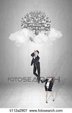 Stock Photo - a man climbing into a cloud with a small globe. Fotosearch