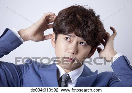 a man looking confused View Large Photo Image Stock Image - a man looking confused. Fotosearch