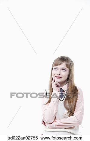 a student in uniform thinking on white background View Large Photo Image Stock Photography - a student in uniform thinking on white background. Fotosearch