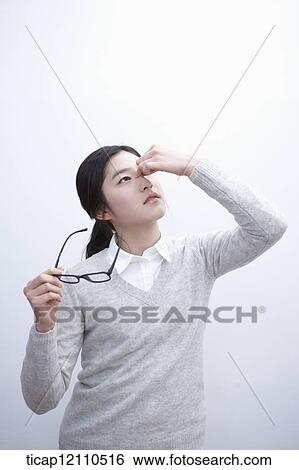 a student looking tired from studying View Large Photo Image Stock Photograph - a student looking tired from studying. Fotosearch