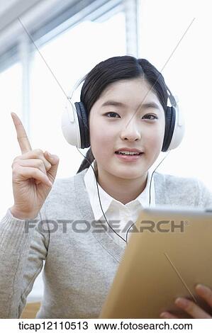 a student self learning using tablet PC View Large Photo Image Stock Image - a student self learning using tablet PC. Fotosearch