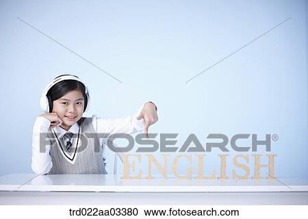 a student with a block of words saying English View Large Photo Image Stock Image - a student with a block of words saying English. Fotosearch