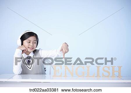 a student with a block of words saying English View Large Photo Image Stock Image - a student with a block of words saying English. Fotosearch