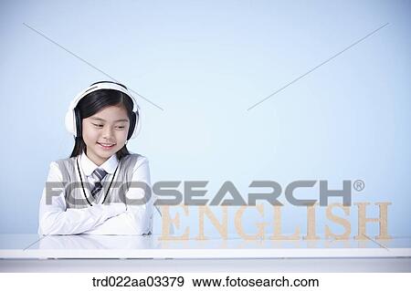 Stock Photo - a student with a block of words saying English. Fotosearch