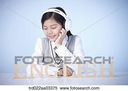 a student with a block of words saying English View Large Photo Image Stock Photography - a student with a block of words saying English. Fotosearch