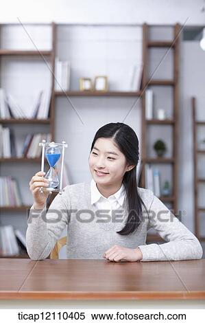 a student with sand hour glass View Large Photo Image Stock Photography - a student with sand hour glass. Fotosearch