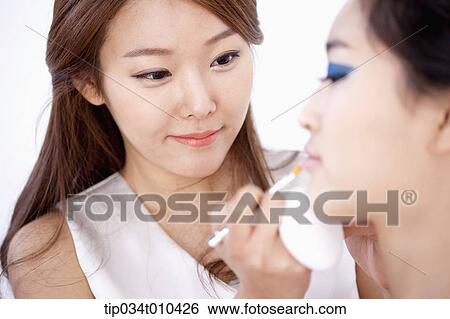 a woman getting professional make up View Large Photo Image Stock Photograph - a woman getting professional make up. Fotosearch