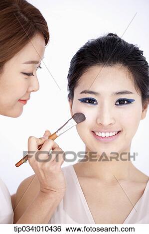 a woman getting professional make up View Large Photo Image Stock Photograph - a woman getting professional make up. Fotosearch