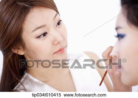 a woman getting professional make up View Large Photo Image Stock Photography - a woman getting professional make up. Fotosearch