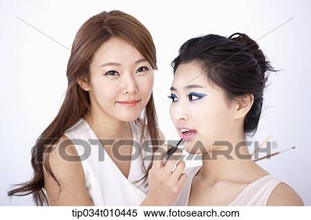 a woman getting professional make up View Large Photo Image Stock Photography - a woman getting professional make up. Fotosearch