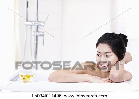 a woman in leaning on a Jacuzzi View Large Photo Image Stock Photograph - a woman in leaning on a Jacuzzi. Fotosearch