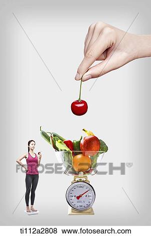 a woman on diet View Large Photo Image Stock Photo - a woman on diet. Fotosearch