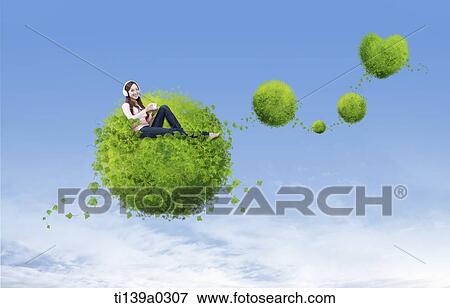 a woman sitting on a bush View Large Photo Image Stock Photo - a woman sitting on a bush. Fotosearch