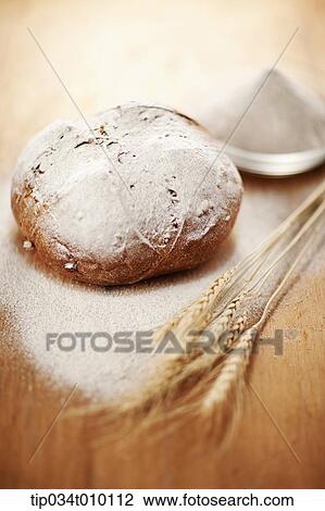 baked bread on a table View Large Photo Image Stock Image - baked bread on a table. Fotosearch