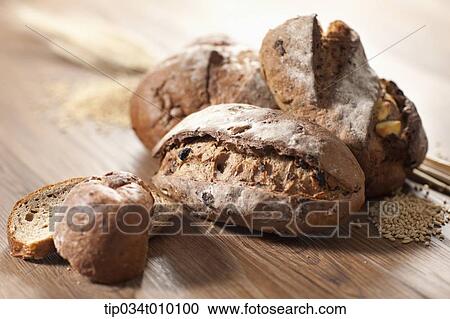 baked bread on table View Large Photo Image Stock Image - baked bread on table. Fotosearch