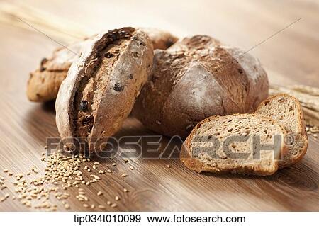 baked bread on table View Large Photo Image Stock Photo - baked bread on table. Fotosearch