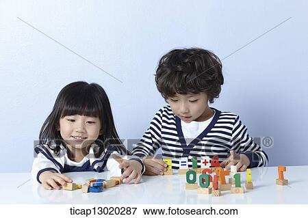 brother and sister playing View Large Photo Image Stock Photo - brother and sister playing. Fotosearch