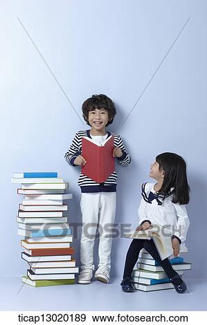 brother and sister reading books View Large Photo Image Stock Photo - brother and sister reading books. Fotosearch