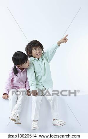 brother and sister sitting View Large Photo Image Picture - brother and sister sitting. Fotosearch