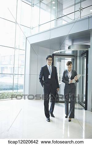 business people standing in the door way View Large Photo Image Stock Image - business people standing in the door way. Fotosearch