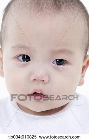 close of a baby after crying View Large Photo Image Stock Photography - close of a baby after crying. Fotosearch