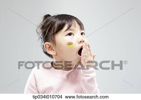 close up of a girl with face paint playing View Large Photo Image Picture - close up of a girl with face paint playing. Fotosearch