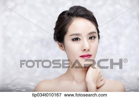 Stock Photo - close up of a woman posing gracefully . Fotosearch