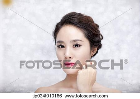 Stock Photograph - close up of a woman posing gracefully . Fotosearch
