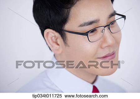 close up shot of a businessman smiling View Large Photo Image Stock Photography - close up shot of a businessman smiling. Fotosearch