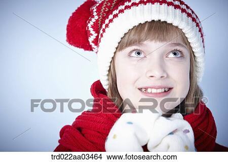 close up shot of a girl in winter outfit posing View Large Photo Image Picture - close up shot of a girl in winter outfit posing. Fotosearch