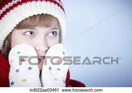 close up shot of a girl in winter outfit posing View Large Photo Image Stock Image - close up shot of a girl in winter outfit posing. Fotosearch