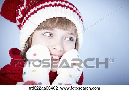 close up shot of a girl in winter outfit posing View Large Photo Image Stock Image - close up shot of a girl in winter outfit posing. Fotosearch