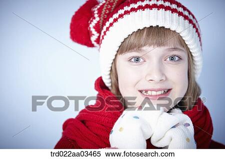 close up shot of a girl in winter outfit posing View Large Photo Image Stock Photography - close up shot of a girl in winter outfit posing. Fotosearch