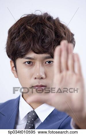 close up shot of a man with hand gesture View Large Photo Image Stock Photography - close up shot of a man with hand gesture. Fotosearch