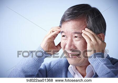 close up shot of a middle aged man frowning View Large Photo Image Stock Photo - close up shot of a middle aged man frowning. Fotosearch