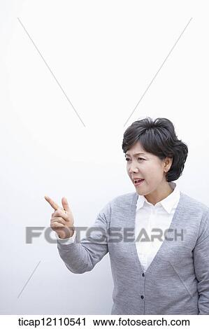 Stock Image - close up shot of a mother scolding. Fotosearch