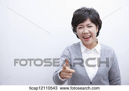 Stock Image - close up shot of a mother scolding. Fotosearch