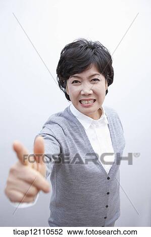 Stock Image - close up shot of a mother scolding. Fotosearch