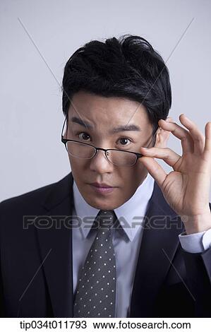 close up shot of businessman with glasses View Large Photo Image Stock Image - close up shot of businessman with glasses. Fotosearch
