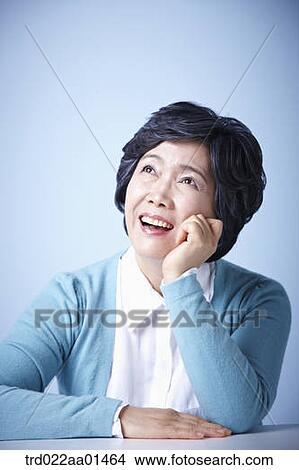 close up shot of middle aged woman smiling View Large Photo Image Picture - close up shot of middle aged woman smiling. Fotosearch