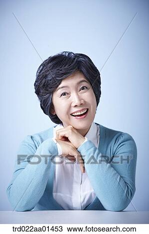 close up shot of middle aged woman smiling View Large Photo Image Stock Image - close up shot of middle aged woman smiling. Fotosearch