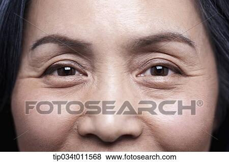 close up shot of middle aged woman smiling View Large Photo Image Stock Photo - close up shot of middle aged woman smiling. Fotosearch