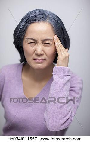 Stock Photo - close up shot of stressed middle aged woman . Fotosearch