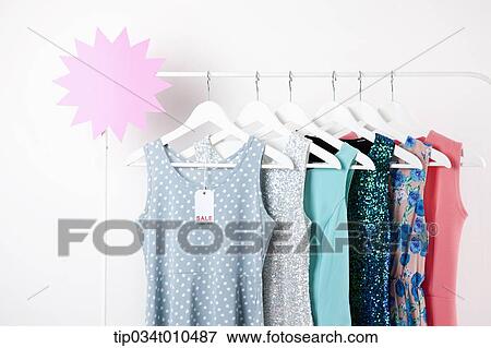 Stock Photo - clothes on a clothing rack. Fotosearch