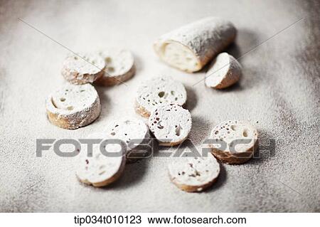 cut baguette with powder View Large Photo Image Stock Image - cut baguette with powder. Fotosearch