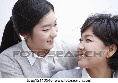 daughter hugging mother View Large Photo Image Stock Image - daughter hugging mother. Fotosearch