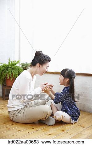 daughter playing with mother View Large Photo Image Stock Image - daughter playing with mother. Fotosearch