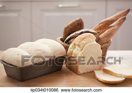 different kinds of bread on table View Large Photo Image Stock Photograph - different kinds of bread on table. Fotosearch
