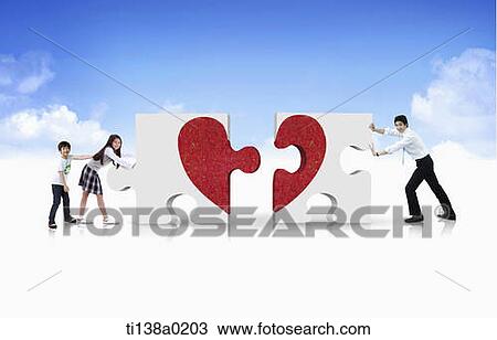Stock Image - father and kids pushing puzzle pieces. Fotosearch