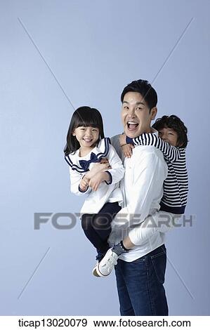 father carrying his kids View Large Photo Image Stock Photo - father carrying his kids. Fotosearch